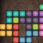Farebná mozaika rôznych geometrických tvarov a vzorov na tmavom pozadí