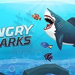 Veľký žralok s otvorenými ústami pláva medzi farebnými rybami v modrom oceáne, s názvom Angry Sharks na screen-e