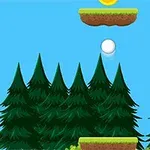 Biely guličkový objekt skáče medzi platformami s mincami na pozadí zelených stromov a modrej oblohy