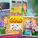 Malé dievčatko s blond vlasmi drží fotoaparát, obklopené obrázkami s akváriovými rybičkami a nápisom Baby Hazel Gold Fish