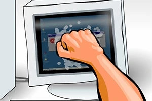 Päsť udiera do monitora počítača, pričom rozbíja obrazovku