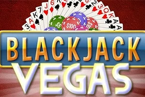 Hracie karty rozložené za žetónmi rôznych hodnôt a nápisom Blackjack Vegas na pozadí