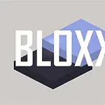 Nápis BLOXX na sivom pozadí so svetlomodrým a tmavým blokom