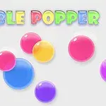 Farebné bubliny rôznych veľkostí na bielom pozadí s názvom Bubble Popper v pestrofarebnom písme