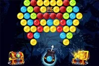 Hra Bubble Shooter, v ktorej hráč zbiera zlaté truhlice v každej úrovni