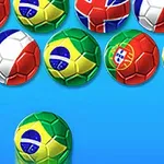 Farebné futbalové lopty s vlajkami rôznych krajín na modrom pozadí