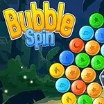 Farebné bubliny usporiadané v kruhu s hviezdou v strede a textom Bubble Spin v pozadí