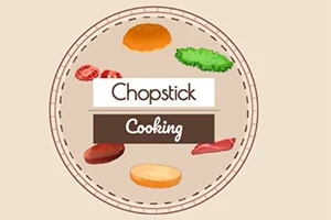 Kruh s nápisom Chopstick Cooking obklopený obrázkami potravín ako žemľa, šalát, paradajka, klobása a inokedy zelenina