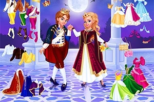Princ a princezná tancujú na parkete obklopení rôznymi pestrofarebnými odevmi