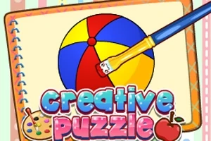 Štetec maľuje farebnú loptu na papieri s názvom Creative Puzzle a pastelovými okrajmi