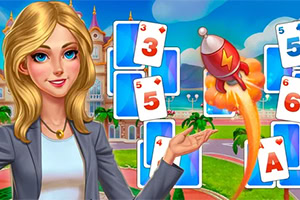 Žena s dlhými blond vlasmi stojí pred kartami s číslami a písmenami, pričom v pozadí je budova a lietajúcom raketka
