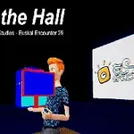 Muž s oranžovými vlasmi drží veľký modro-červený objekt na tmavom pozadí s nápisom „Fall on the Hall“ hore