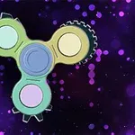 Farebný fidget spinner s ozubenými kolieskami na fialovom pozadí s bublinkovými vzormi