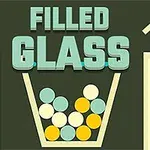 Nádoba naplnená farebnými guľôčkami s nápisom FILLED GLASS nad ňou