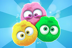 Tri chlpaté farebné guľôčky s veľkými očami na modrom lúčovitom pozadí