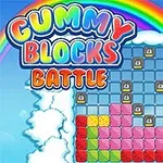 Farebný text s nápisom Gummy Blocks Battle s tetrisom z farebných blokov obklopený dúhou a oblakmi