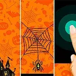 Pavúk visiaci na pavučine vedľa prsta dotýkajúceho sa obrazovky s cyklami na oranžovom pozadí s halloweenskými motívmi