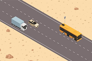 Na obrázku je cesta cez púšť s nákladným autom, osobným autom a žltým autobusom