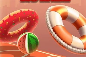 Farebný kruhový plavák, cukrová šiška a lopta pripomínajúca melón na oranžovom pozadí