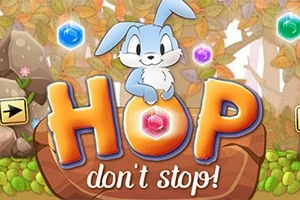 Modrý zajac sedí na nápise HOP dont stop!