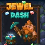 Trpaslík s hnedej bradou a krompáčom stojí vedľa vozíka plného žiarivých drahokamov pred nápisom JEWEL DASH