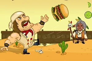 Muž s bandánou na hlave hádže hamburgera na púšti, zatiaľ čo starší muž stojí s kopijou pred vlakom v pozadí