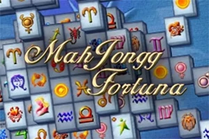 Stohy dlaždíc s astrologickými symbolmi a nápisom MahJongg Fortuna na modrom pozadí