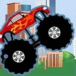 Červené auto s plameňmi na veľkých kolesách skáče pred panorámou mesta