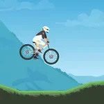 Cyklista na horskom bicykli skáče cez kopec na pozadí hôr a modrej oblohy