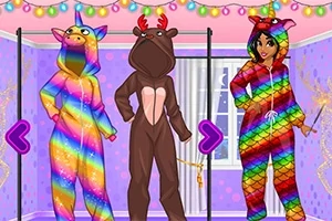 Tri postavy oblečené v pestrofarebných onesies, jedna ako jednorožec, druhá ako sob a tretia ako dúhový drak, v izbe s farebnými svetlami