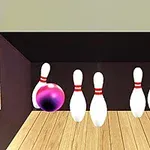 Bowlingová guľa sa kotúľa k piatim kolkom, pričom jeden je práve zasiahnutý