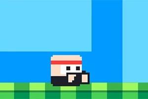 Pixelová postava s červenou čelenkou stojí na zelenej platforme s modrým pozadím