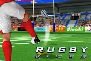 Rugbyový hráč v červených dresoch kope loptu na ihrisku so zaplnenými tribúnami v pozadí