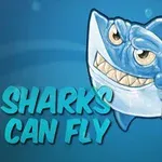 Usmievajúci sa kreslený žralok s nápisom Sharks Can Fly na modrom pozadí