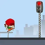 Postava s červenou čiapkou jazdiaca na skateboarde pri semafore so svietiacou červenou v meste