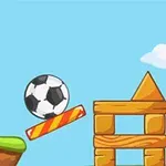 Futbalová lopta vo vzduchu medzi futbalovou bránkou a drevenými blokmi na modrom pozadí