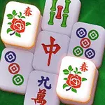 Mahjong kamene s kvetinovým motívom a čínskymi znakmi na zelenom pozadí