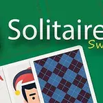 Karty s hodnotami eso a dvojka, spolu s ilustráciou postavy v červeno-bielej čiapke, na zelenom pozadí s nápismi