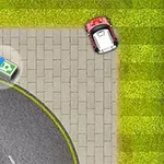 Červené auto je zaparkované na chodníku vedľa cesty s hotovosťou ležiacou na chodníku