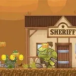 Kovboj strieľa na zeleného obra pred budovou so značkou Sheriff v púštnom prostredí s mincami rozptýlenými na zemi