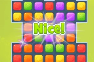 Farebná mriežka s rôznofarebnými kockami a nápisom Nice!