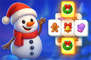 Snehuliak s červenou čiapkou a šálom stojí vedľa herných blokov s vianočnými motívmi, ako sú venčeky, zvonček a rukavica