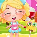 Rozprávková postavička s blond vlasmi a modrou mašľou drží farebné lízanky v tvare jednorožca a hviezdy, s veselým výrazom na tvári